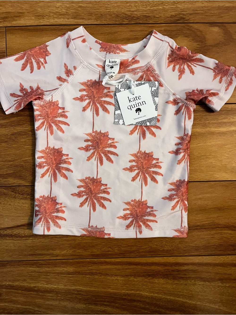 NWT kate quinn Pink Short Sleeve Rash Guard with Coral Palm Print